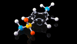 Colourful molecular model of a chemical compound on black background