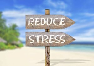 Beach scene with signs reading 'Reduce Stress'