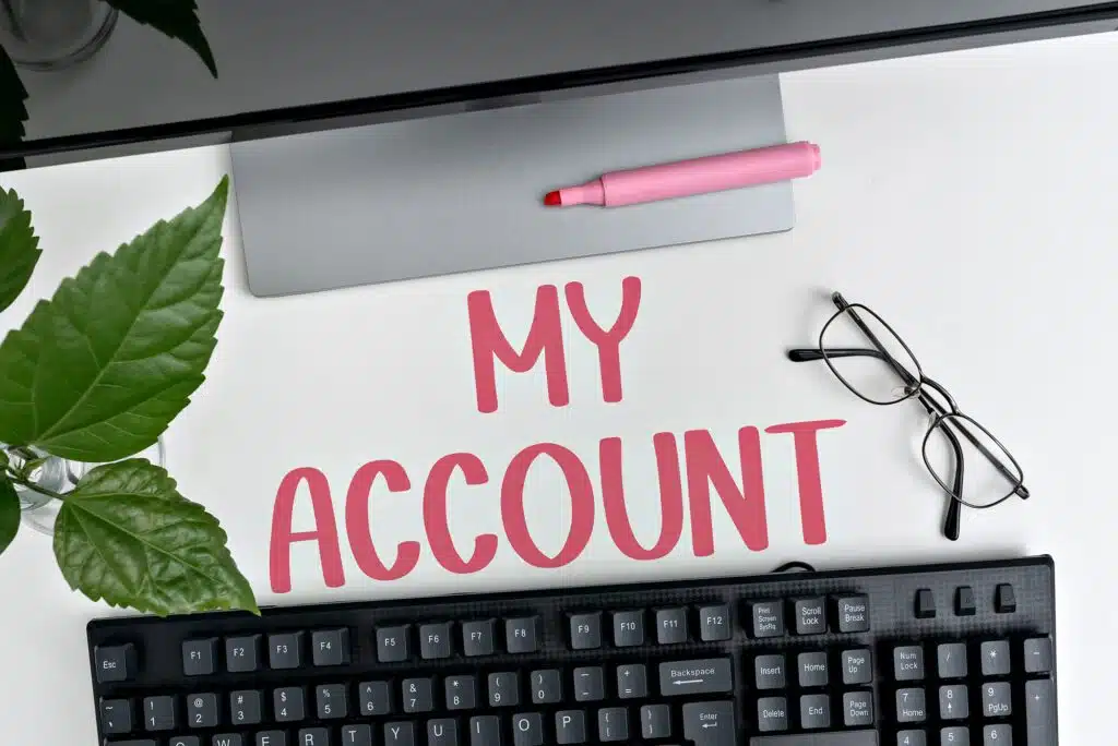 My account concept with keyboard, glasses, plant, and pink highlighter