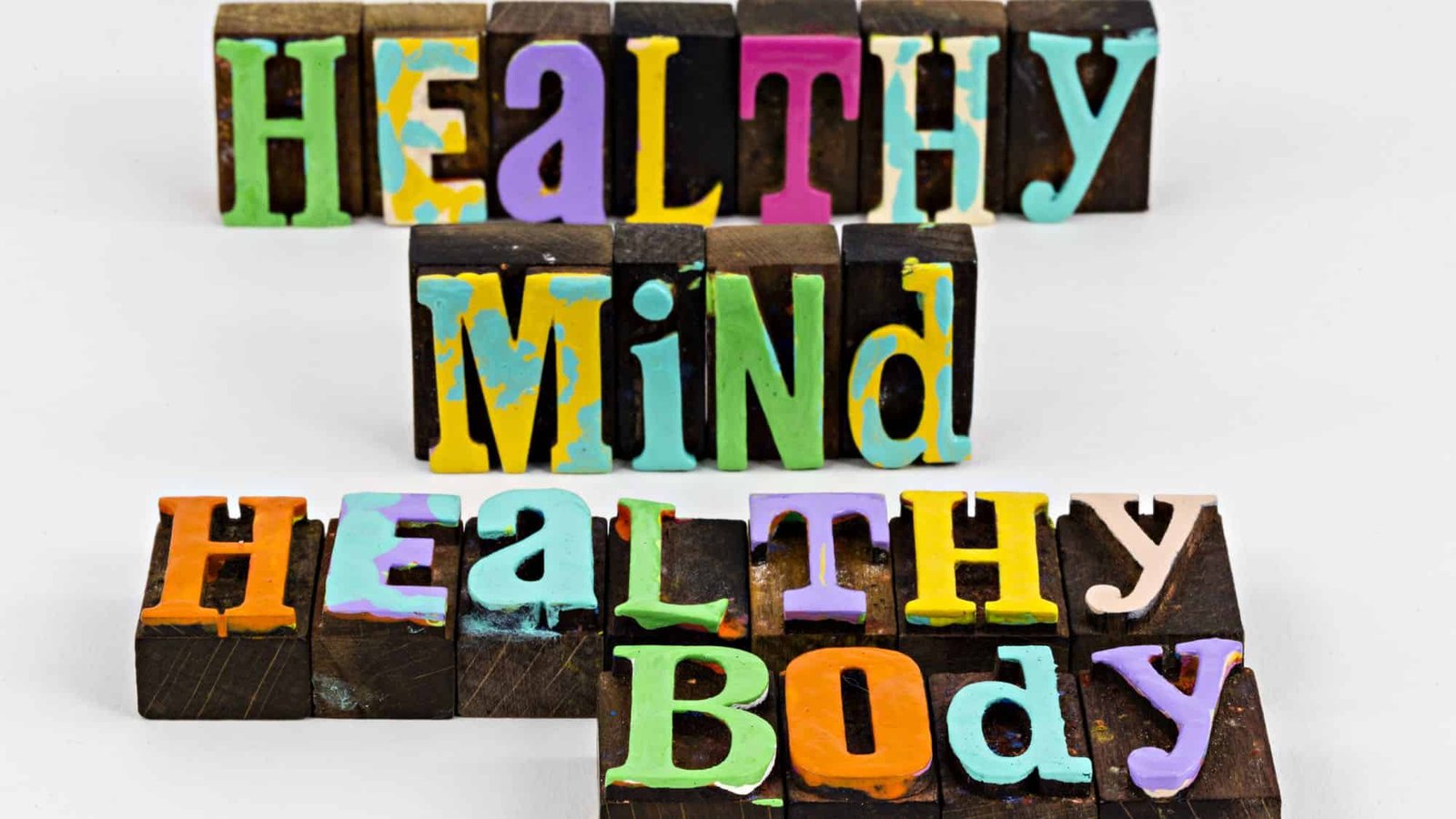 Colourful wooden blocks spell Healthy Mind Healthy Body