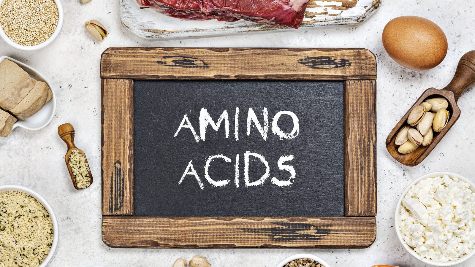 Amino acids concept with various protein-rich foods displayed