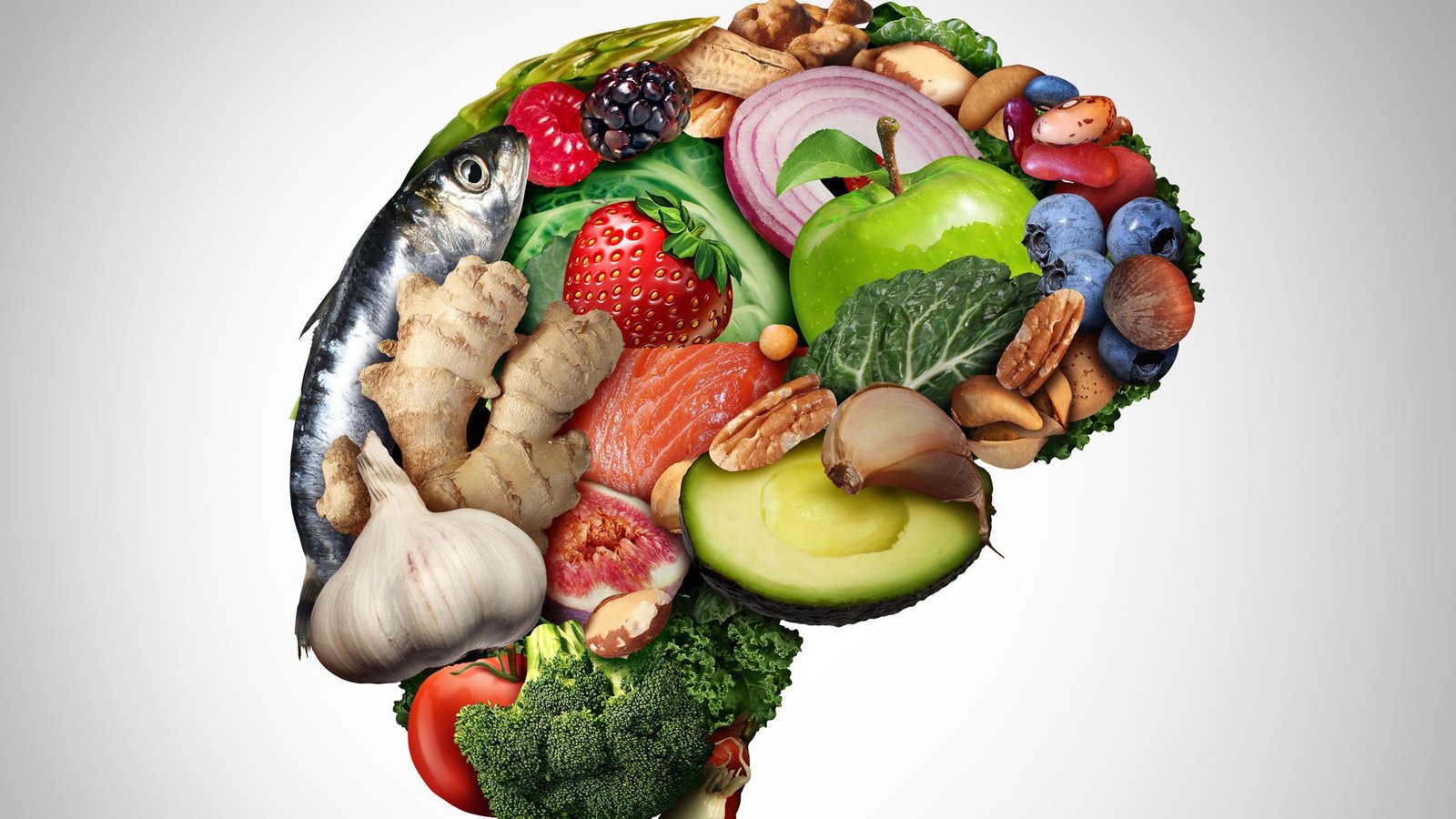 Brain-shaped assortment of brain-boosting foods, including fruits, vegetables, fish, and nuts