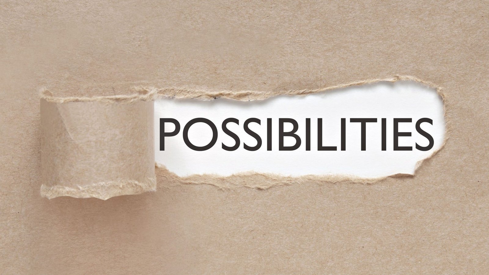 Torn paper revealing the word possibilities